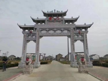 village entrance stone memorial archway, new countryside stone archway, stone gate manufacturer customized production