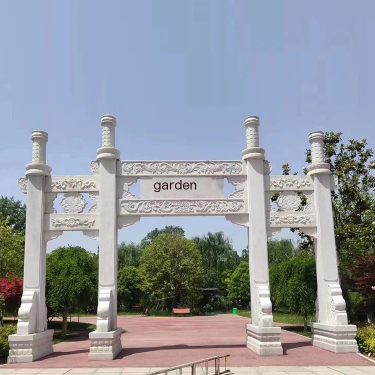 Large White Marble stone carving archway in the granite rock memorial archway square in the scenic spot